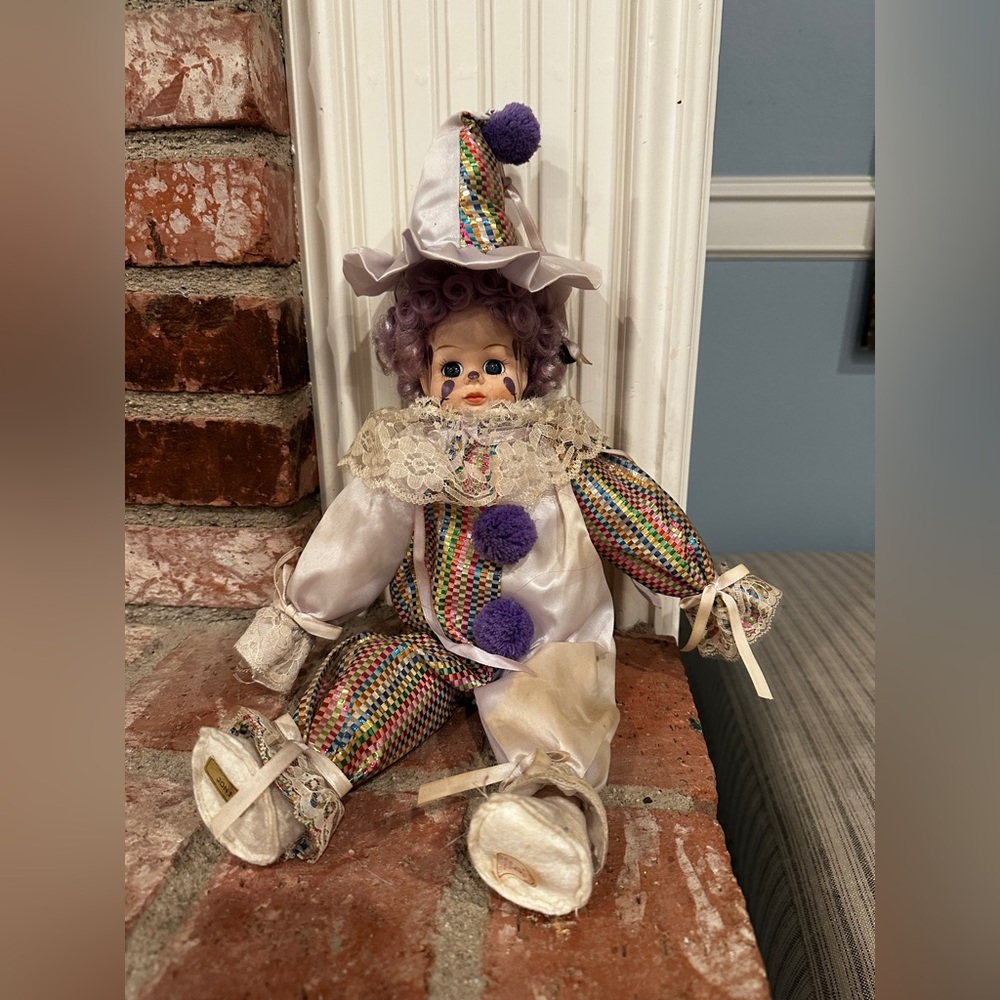 Vintage porcelain clown doll.